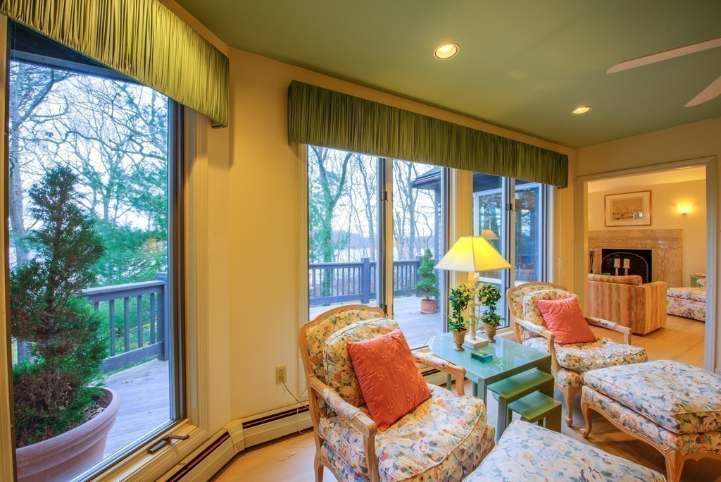 78 Sawmill Road Barnstable, MA 02648 - Photo 10 of 25 a living room with furniture and a large window