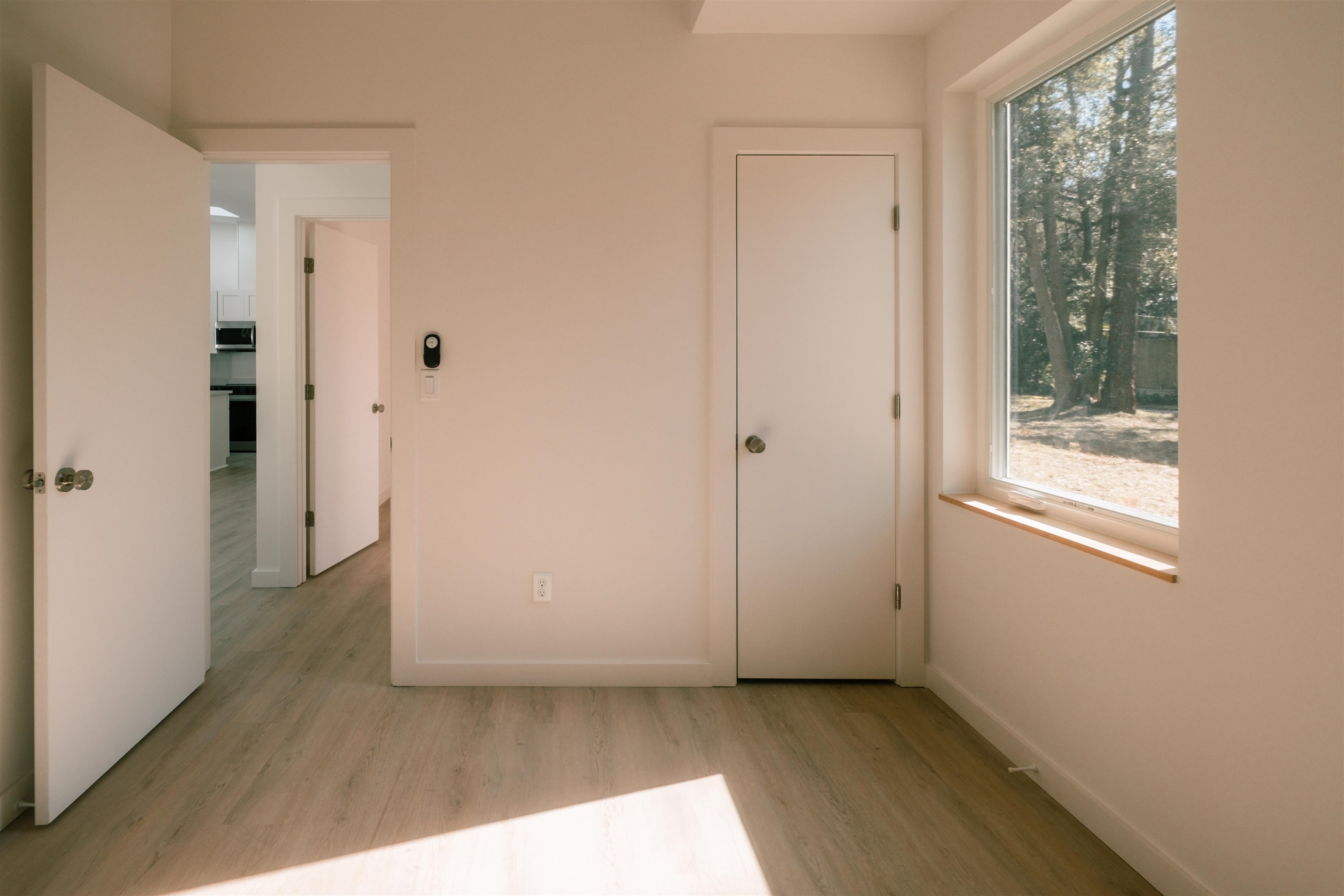 26 South Whitney Street St. Augustine, FL 32084 - Photo 18 of 21 Unfurnished bedroom with light wood-type flooring and baseboards