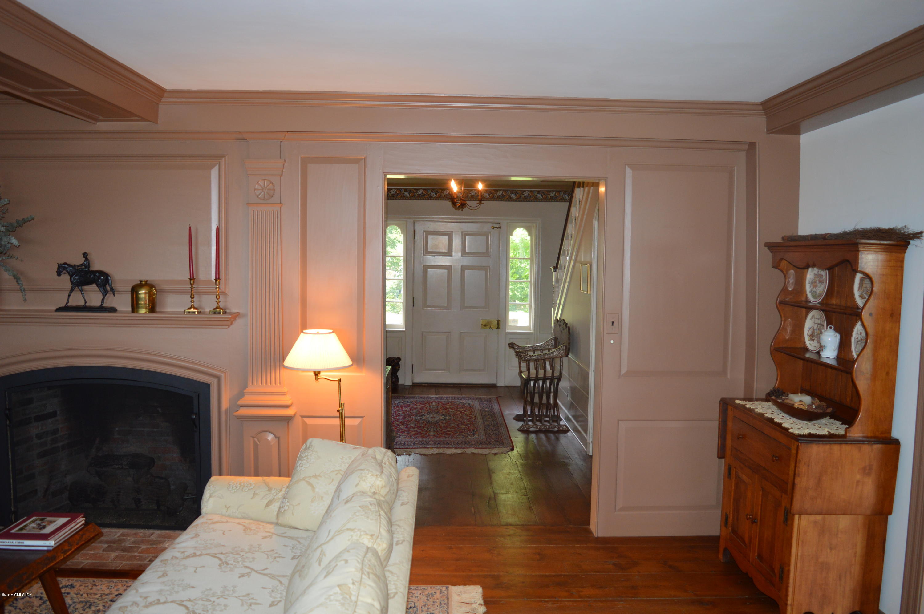 2 Bridle Path Lane Riverside, CT 06878 - Photo 12 of 24 a living room with furniture and a fireplace