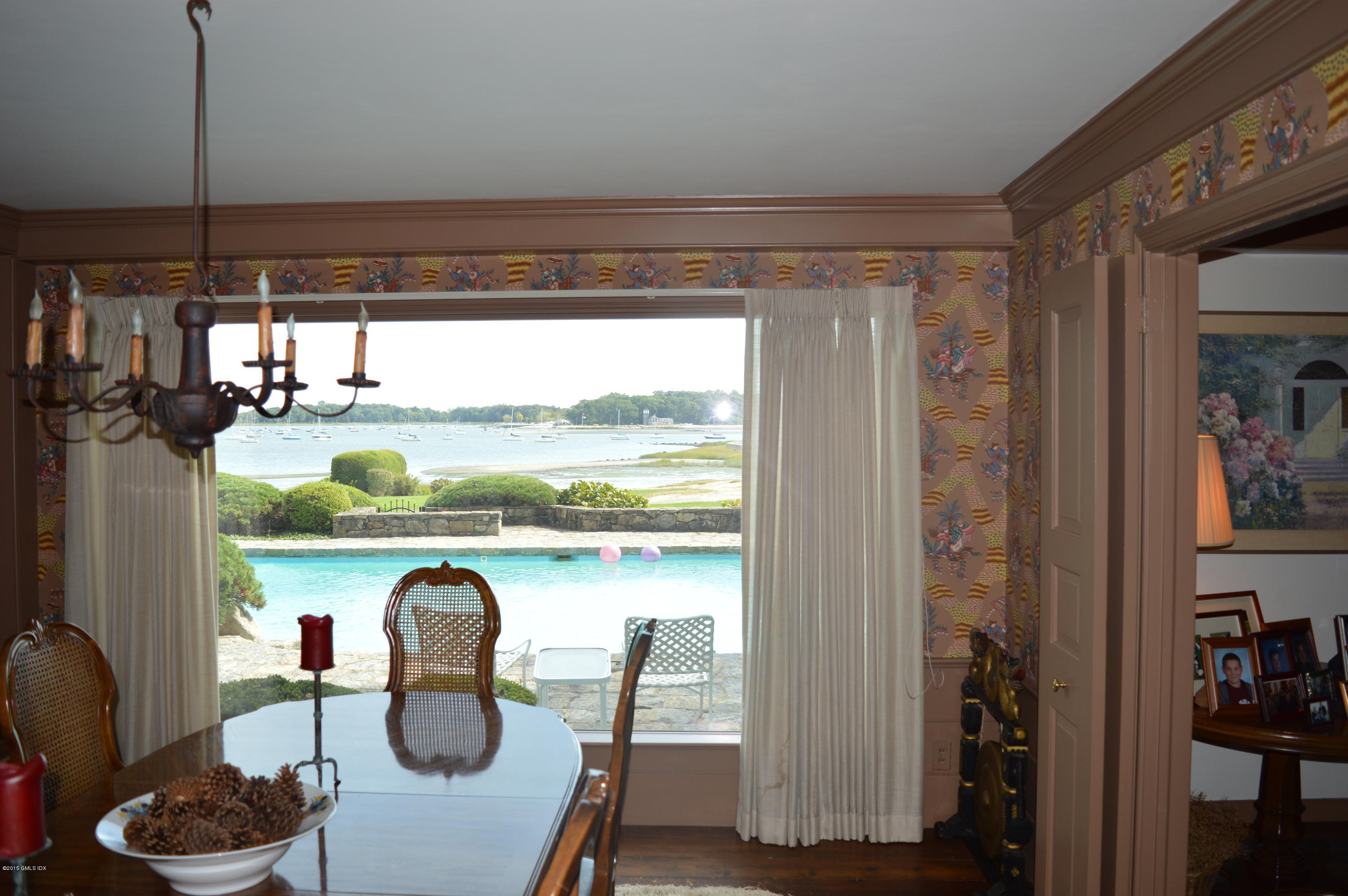 2 Bridle Path Lane Riverside, CT 06878 - Photo 14 of 24 a kitchen with a table and chairs