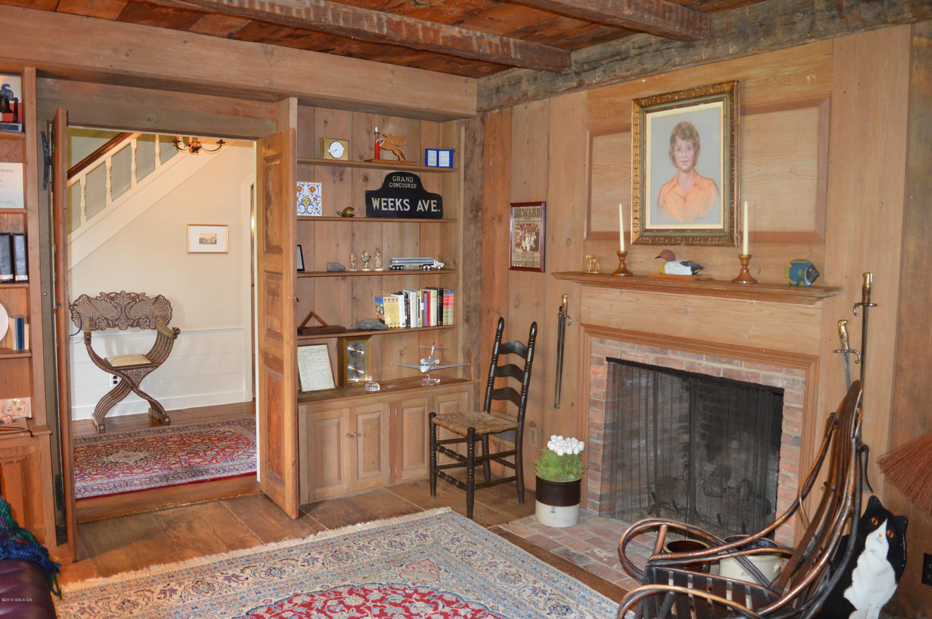 2 Bridle Path Lane Riverside, CT 06878 - Photo 15 of 24 a living room with furniture and a fireplace