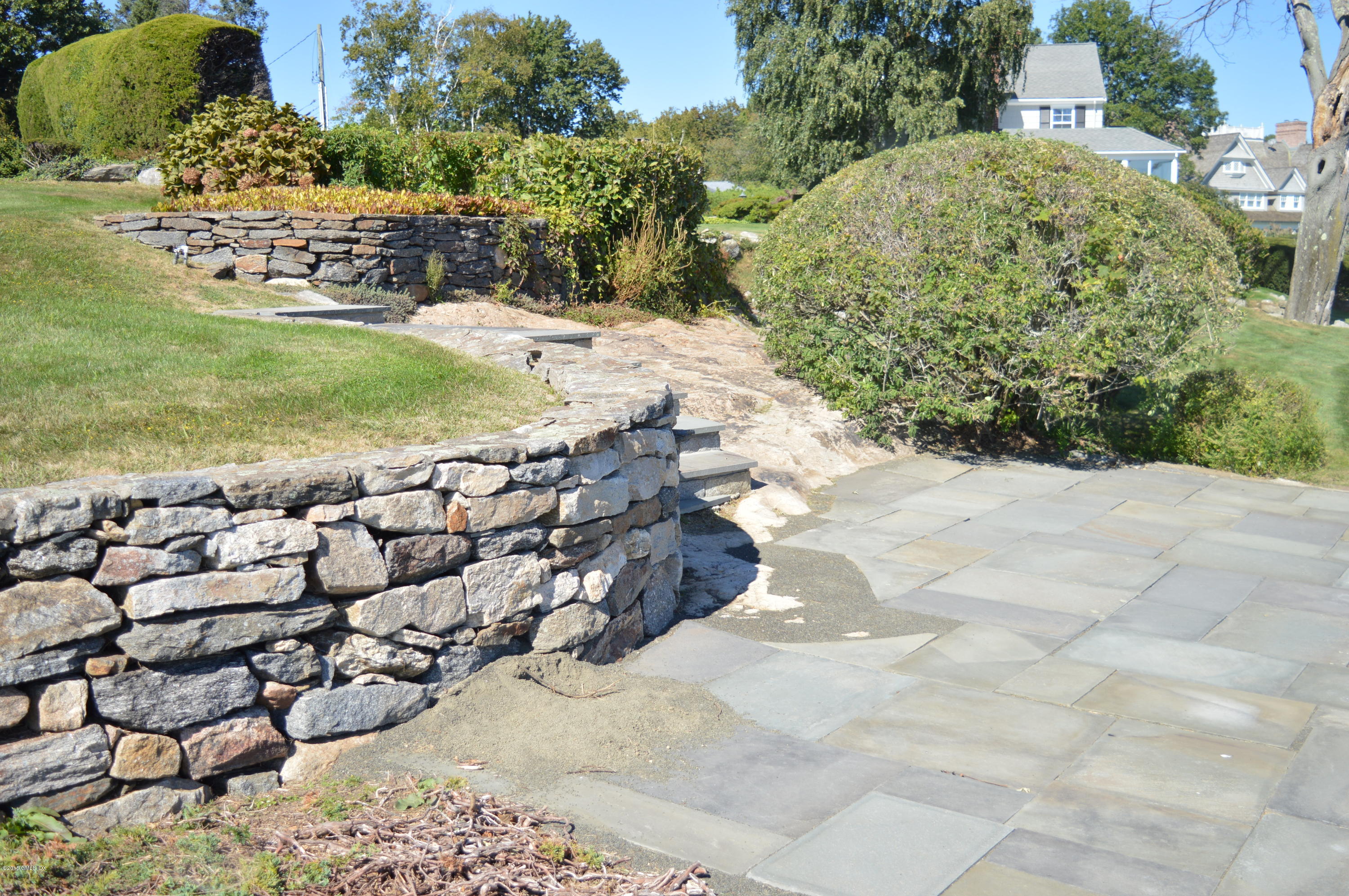 2 Bridle Path Lane Riverside, CT 06878 - Photo 5 of 24 a view of a yard with an umbrella