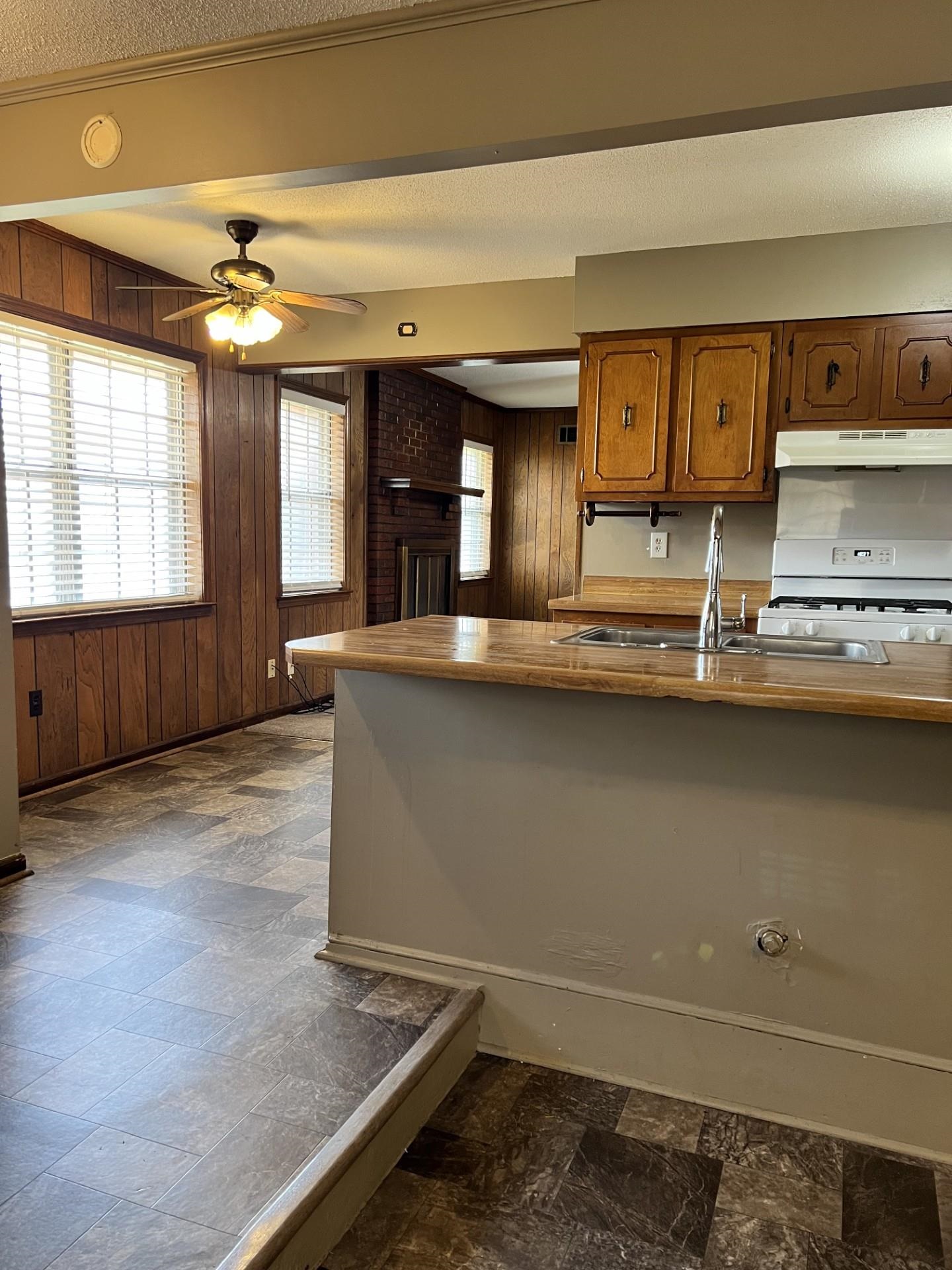 3472 Castleman Street Memphis, TN 38118 - Photo 14 of 30 a view of kitchen with stainless steel appliances granite countertop cabinets and a potted plant