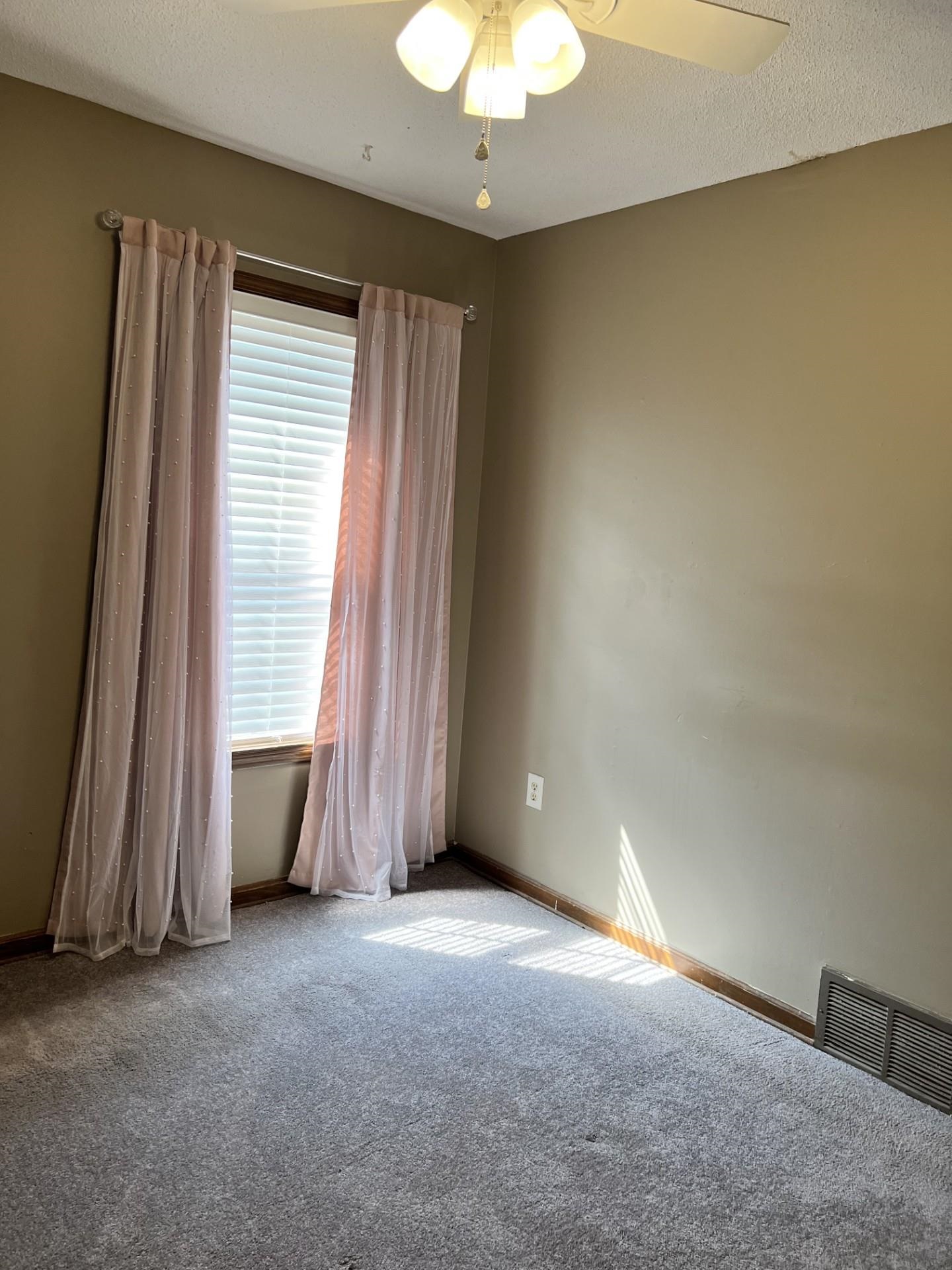 3472 Castleman Street Memphis, TN 38118 - Photo 19 of 30 an empty room with a window