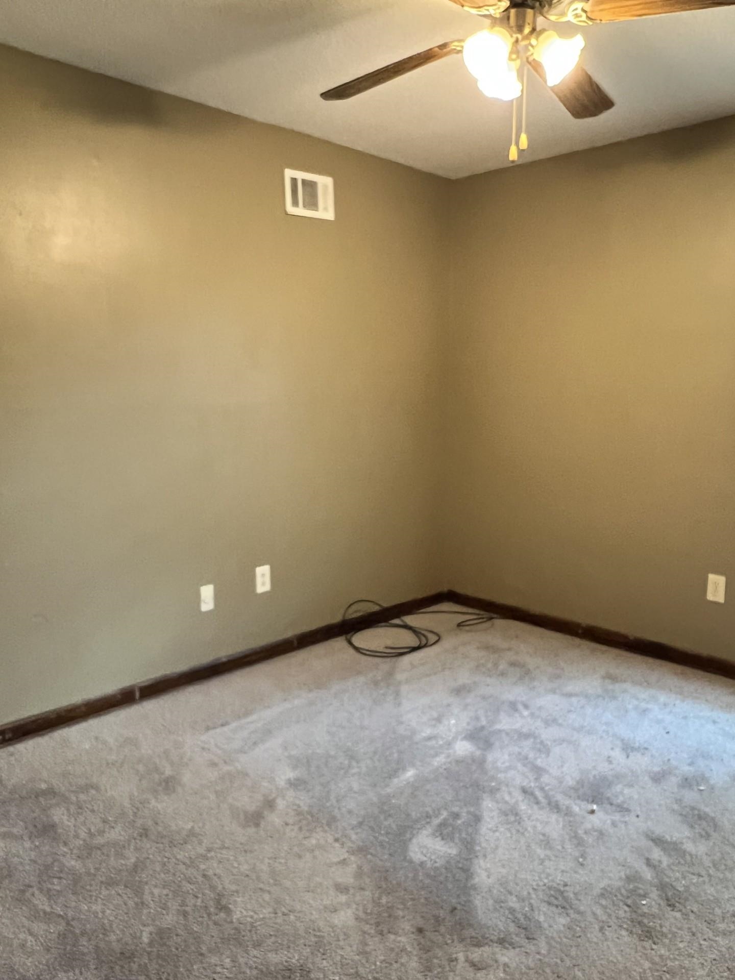 3472 Castleman Street Memphis, TN 38118 - Photo 22 of 30 an empty room with a chandelier fan