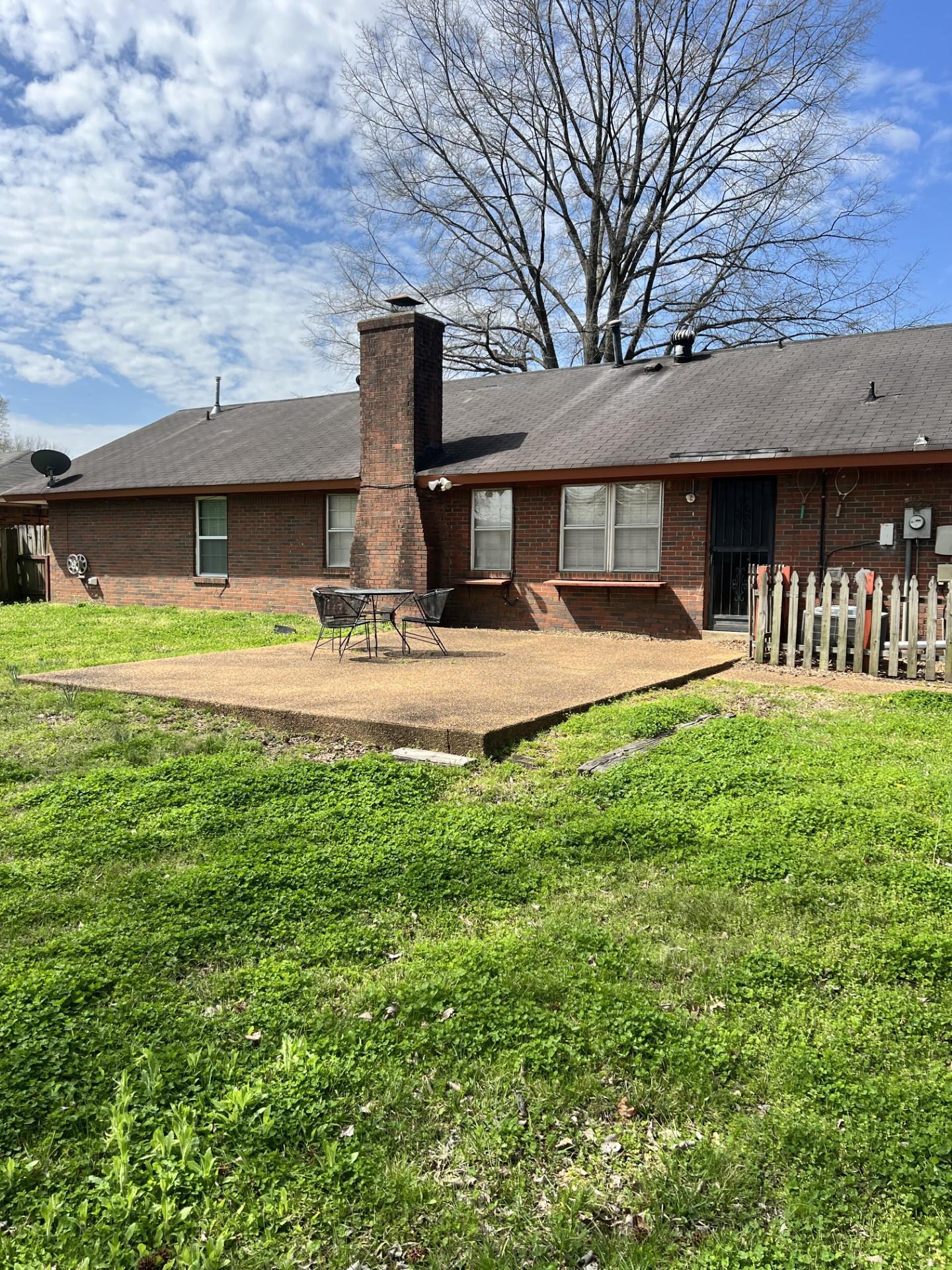 3472 Castleman Street Memphis, TN 38118 - Photo 30 of 30 a front view of a house with a yard