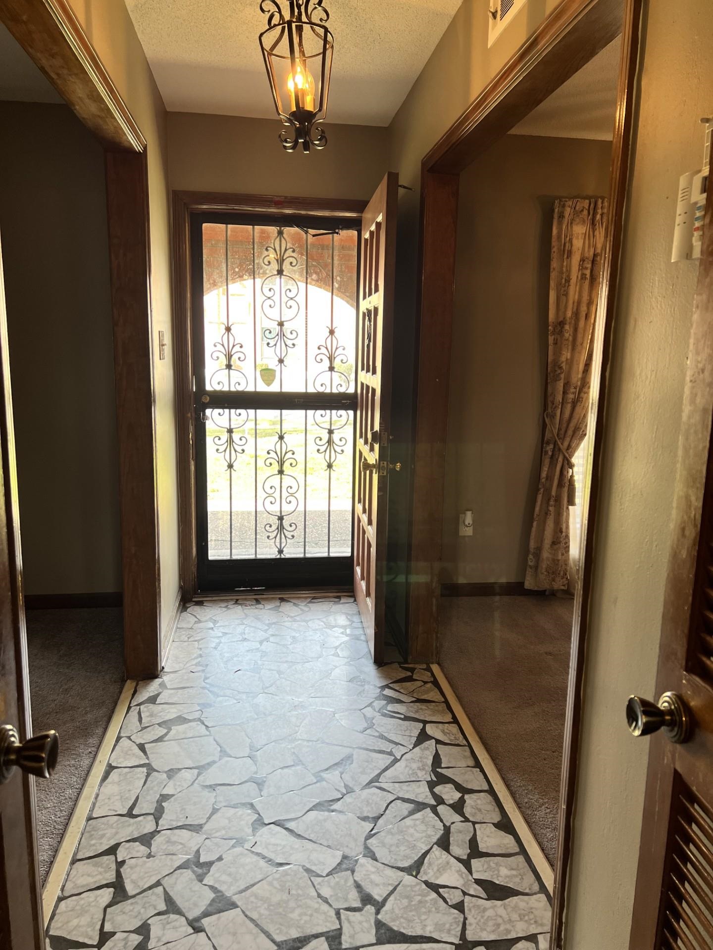 3472 Castleman Street Memphis, TN 38118 - Photo 5 of 30 a view of an empty room with a window