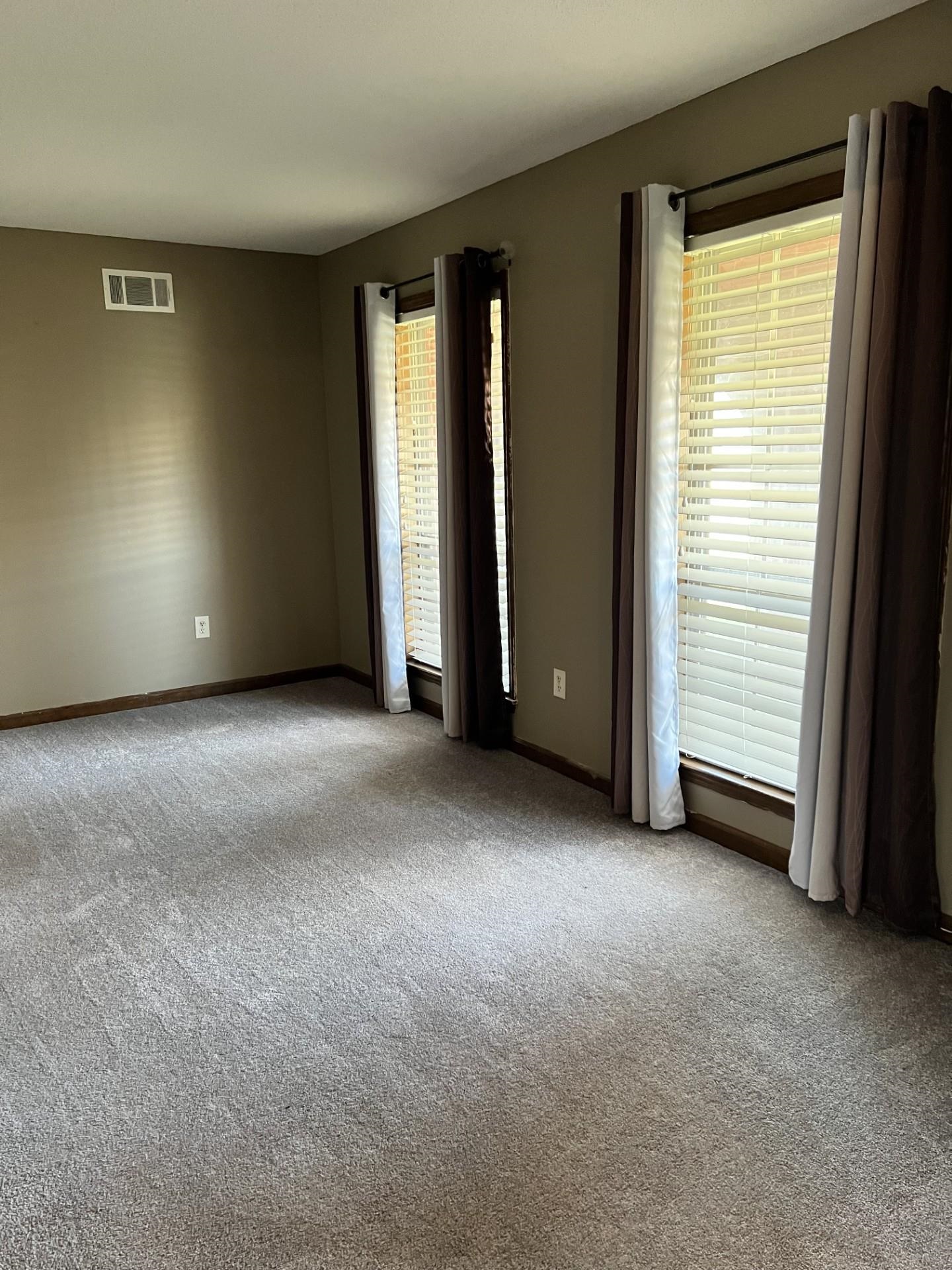 3472 Castleman Street Memphis, TN 38118 - Photo 7 of 30 an empty room with windows and closet