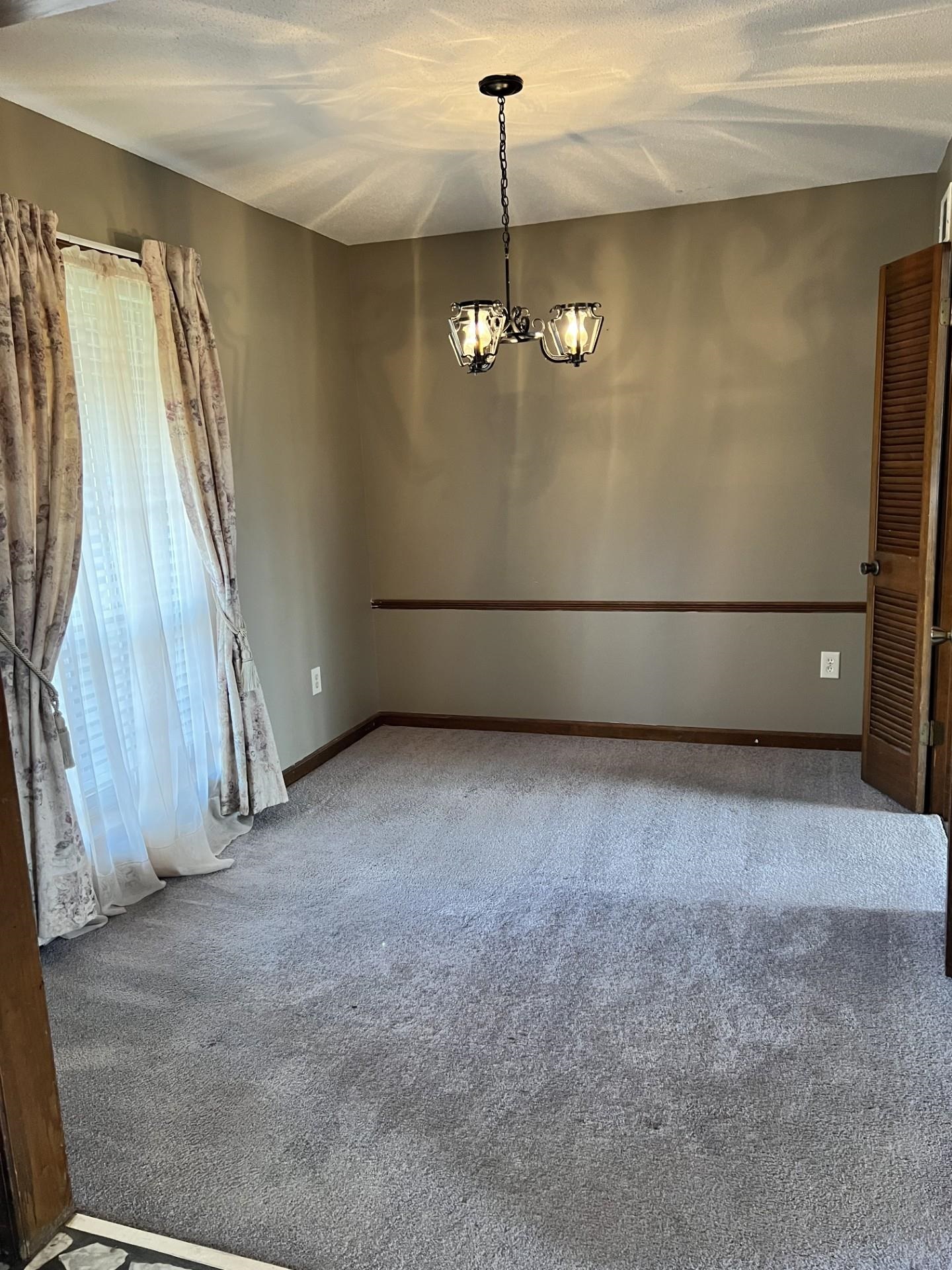 3472 Castleman Street Memphis, TN 38118 - Photo 8 of 30 a view of an empty room with a window