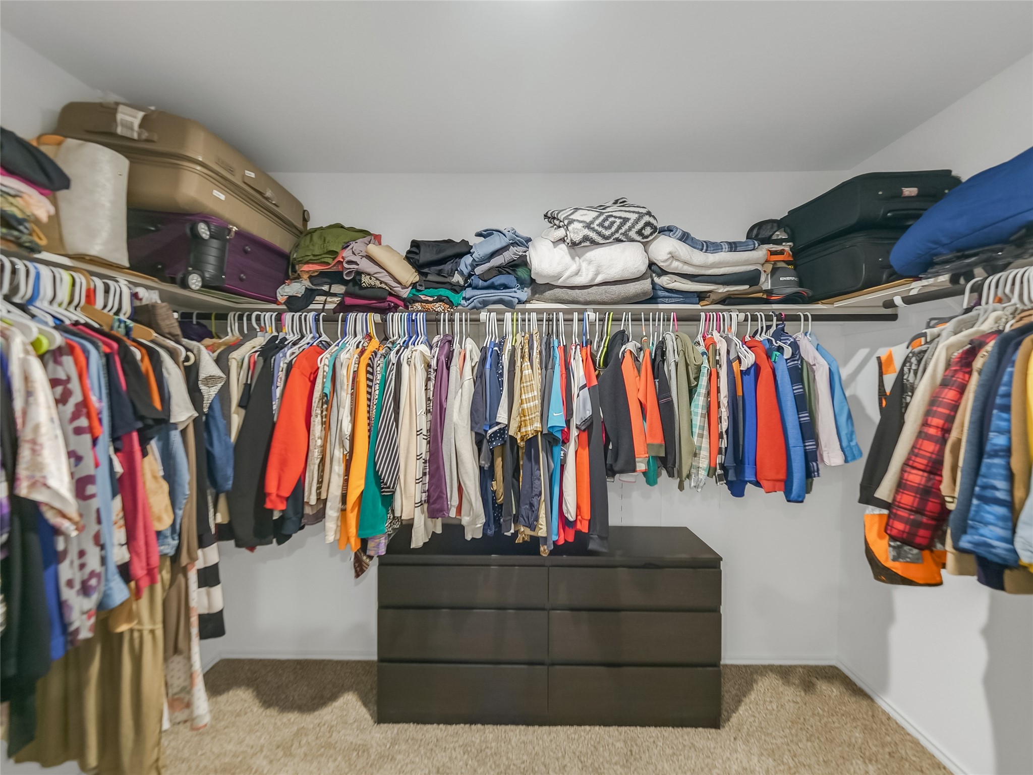 40422 Basalt Elm Road Magnolia, TX 77354 - Photo 13 of 27 a view of walk in closet with clothes