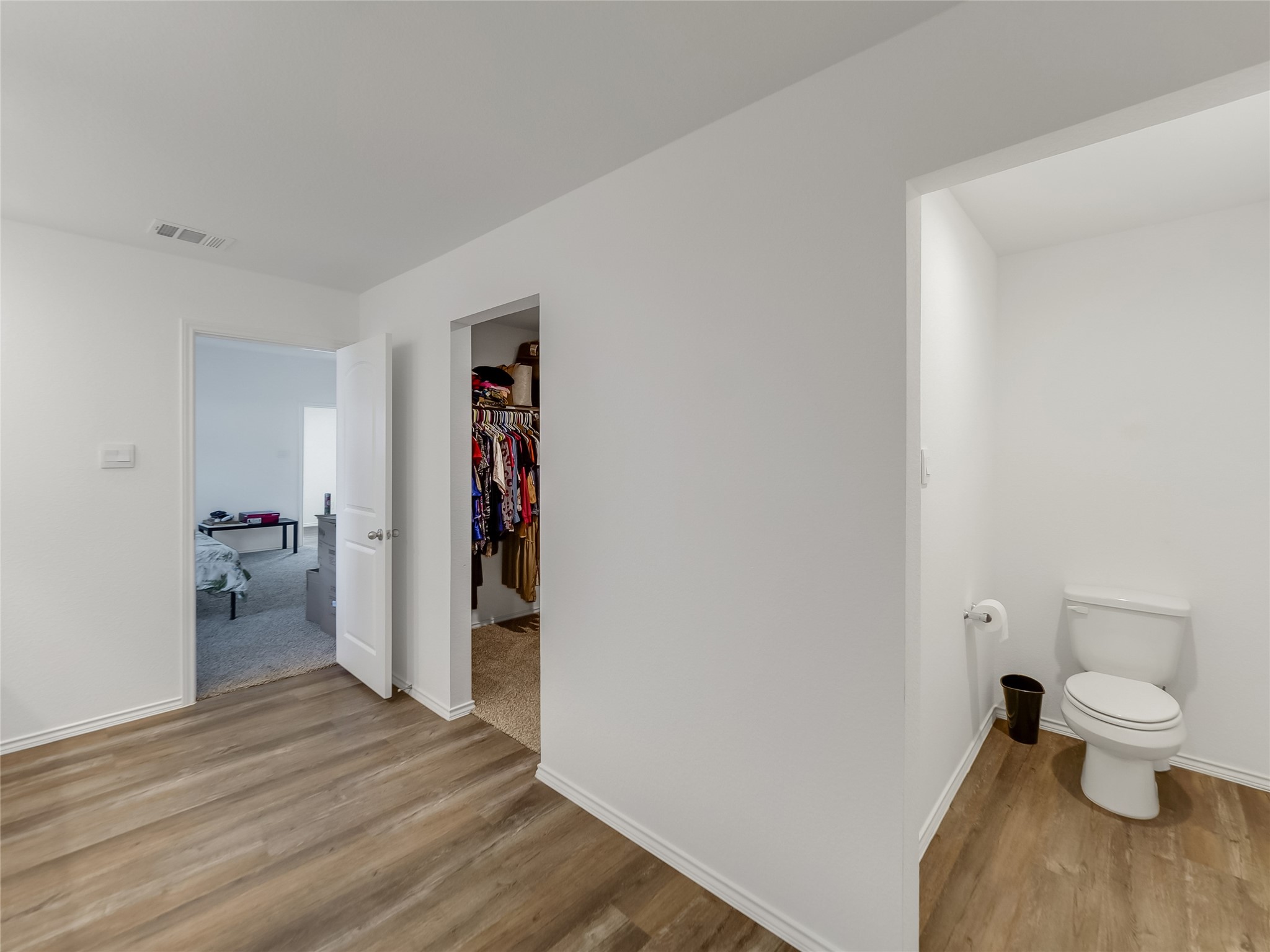 40422 Basalt Elm Road Magnolia, TX 77354 - Photo 14 of 27 a bathroom with a toilet and a view of bathroom