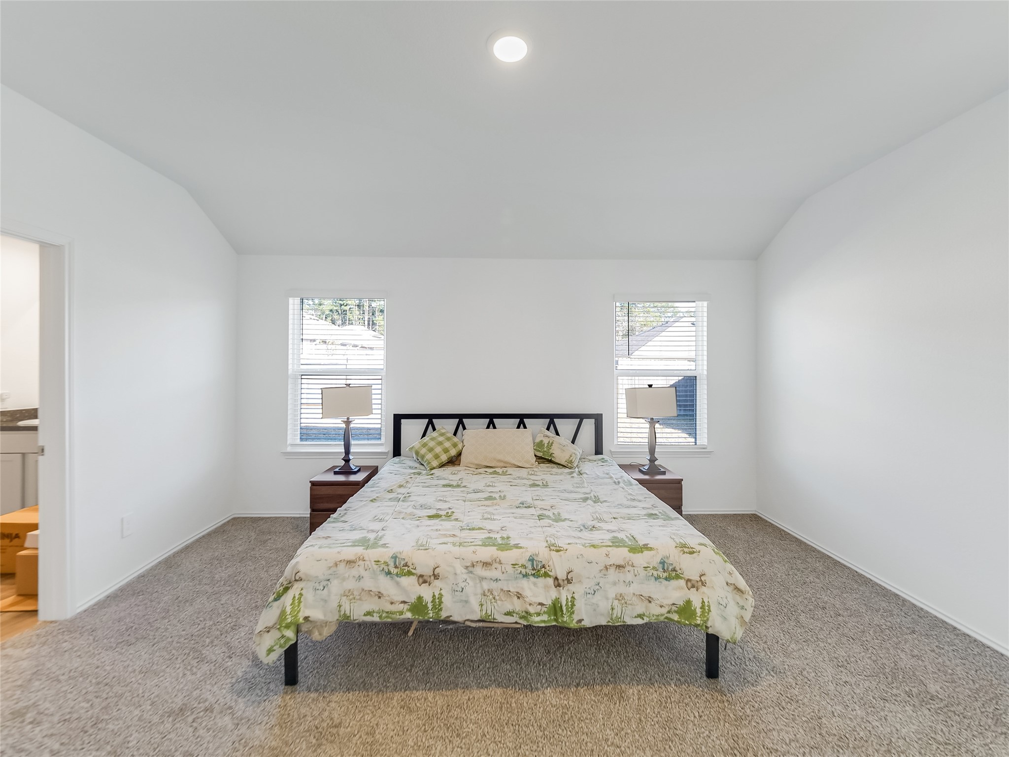 40422 Basalt Elm Road Magnolia, TX 77354 - Photo 16 of 27 a bed sitting in a bedroom next to a window