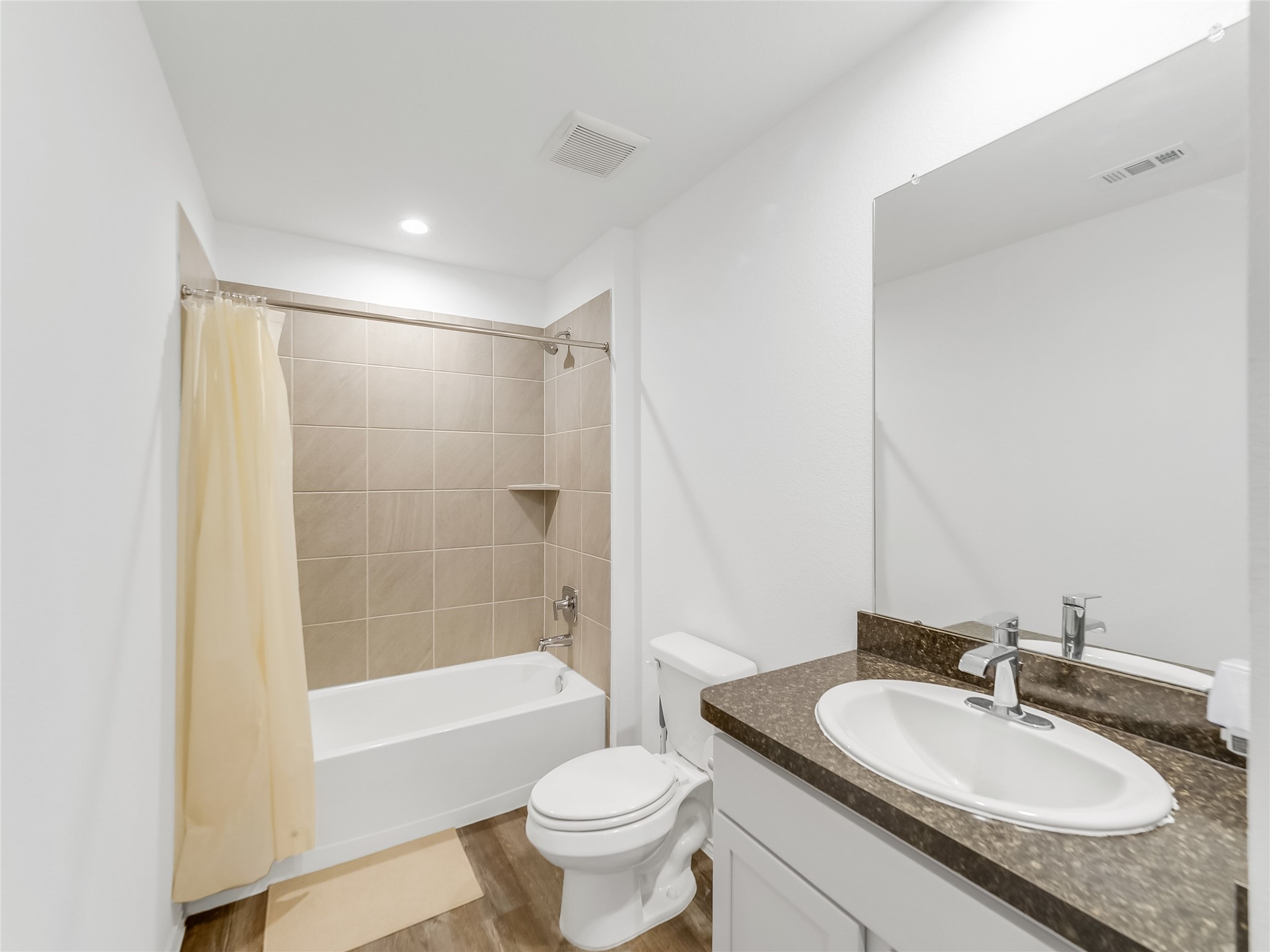 40422 Basalt Elm Road Magnolia, TX 77354 - Photo 18 of 27 a bathroom with a granite countertop sink toilet mirror and shower