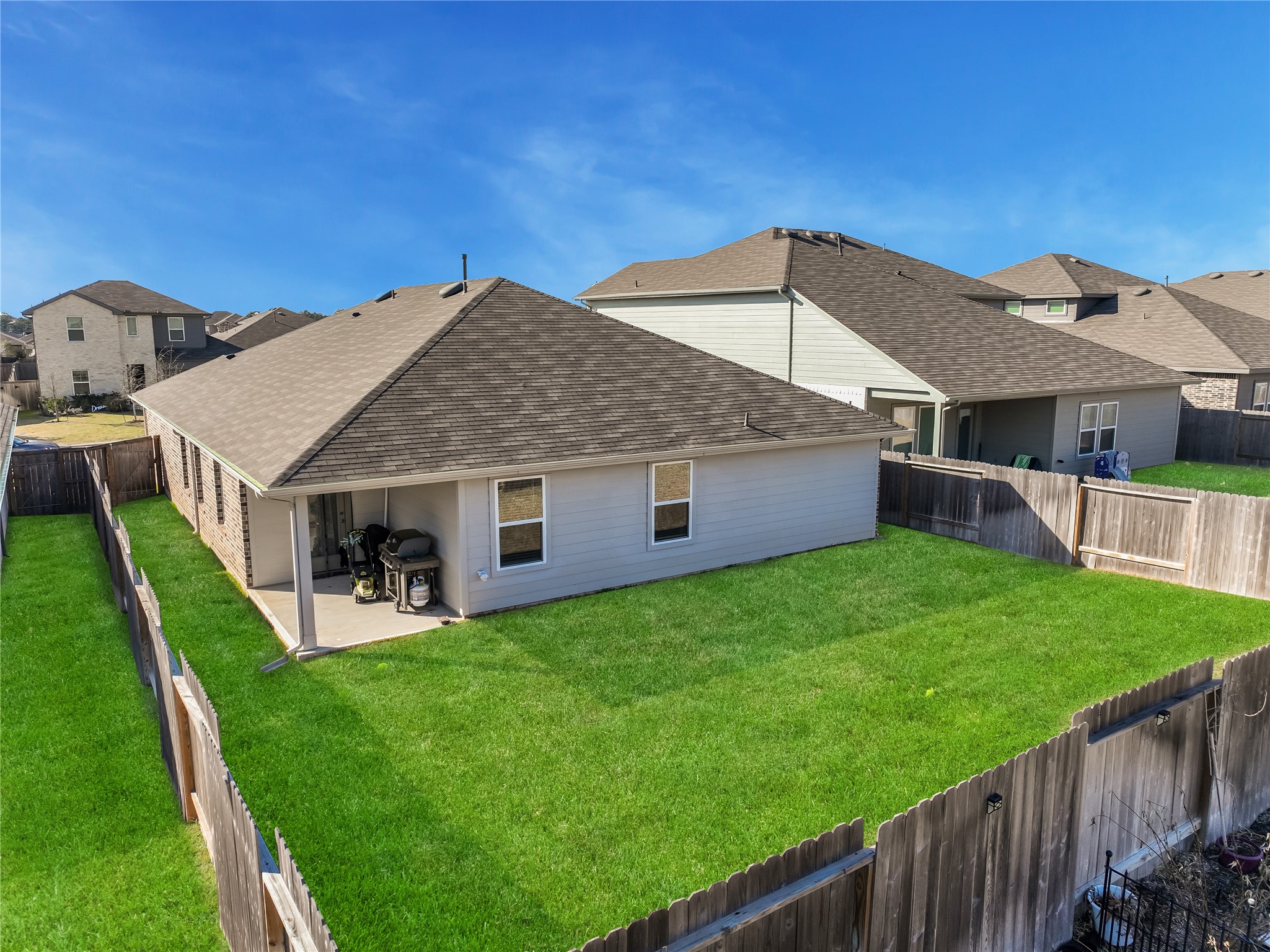 40422 Basalt Elm Road Magnolia, TX 77354 - Photo 24 of 27 a view of a house with backyard and porch