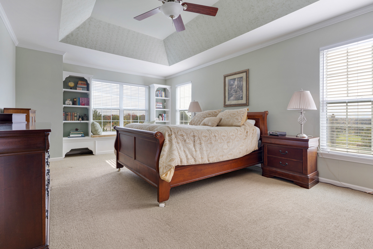 1127 Pine Valley Court Elgin, IL 60124 - Photo 14 of 27 a bedroom with a bed dresser and a window