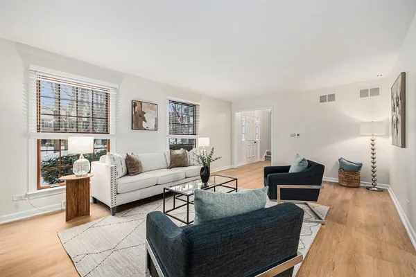 a living room with furniture and a couch