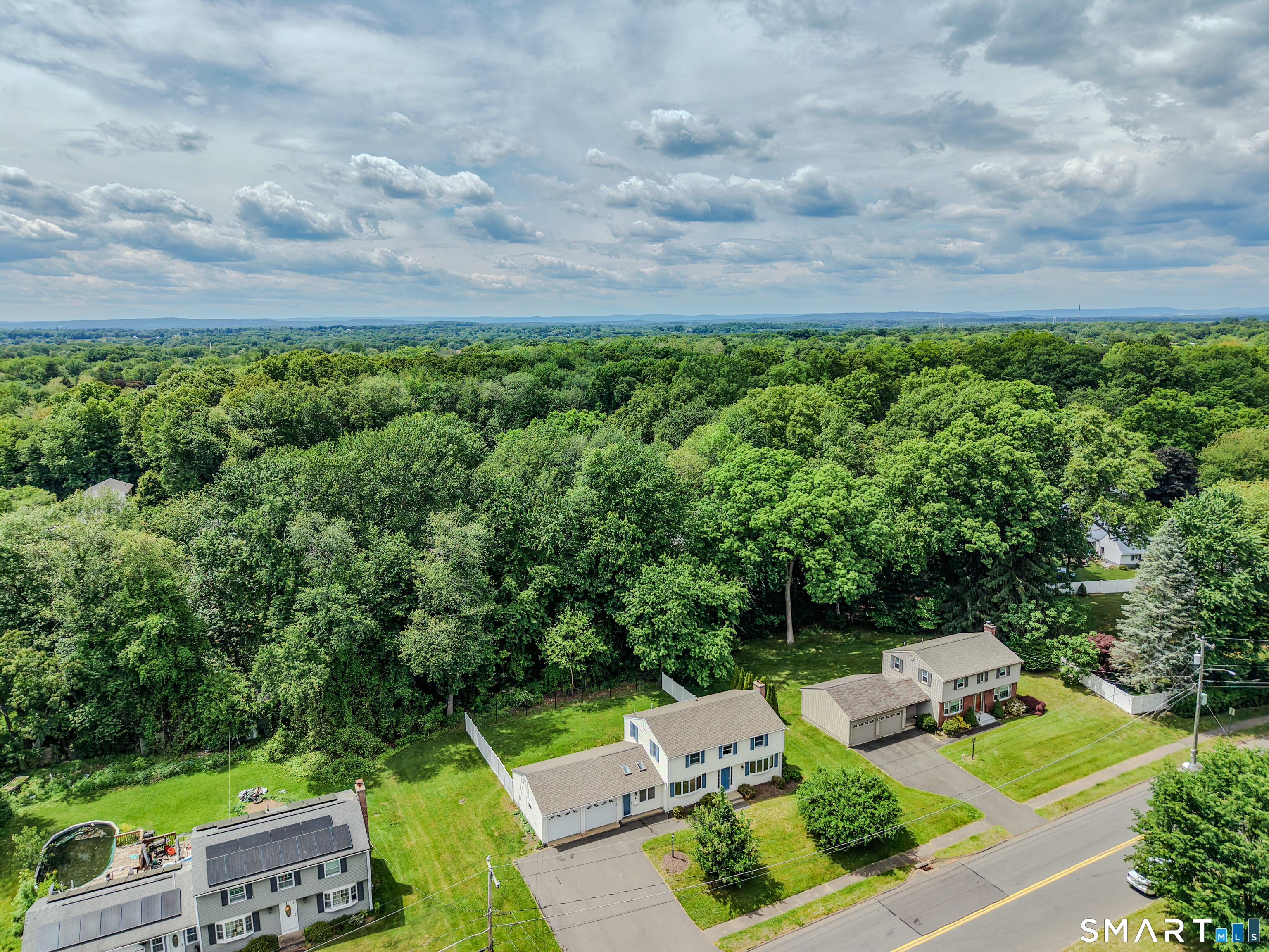 6 Cartier Road Enfield, CT 06082 - Photo 38 of 40 an aerial view of a house with swimming pool and garden