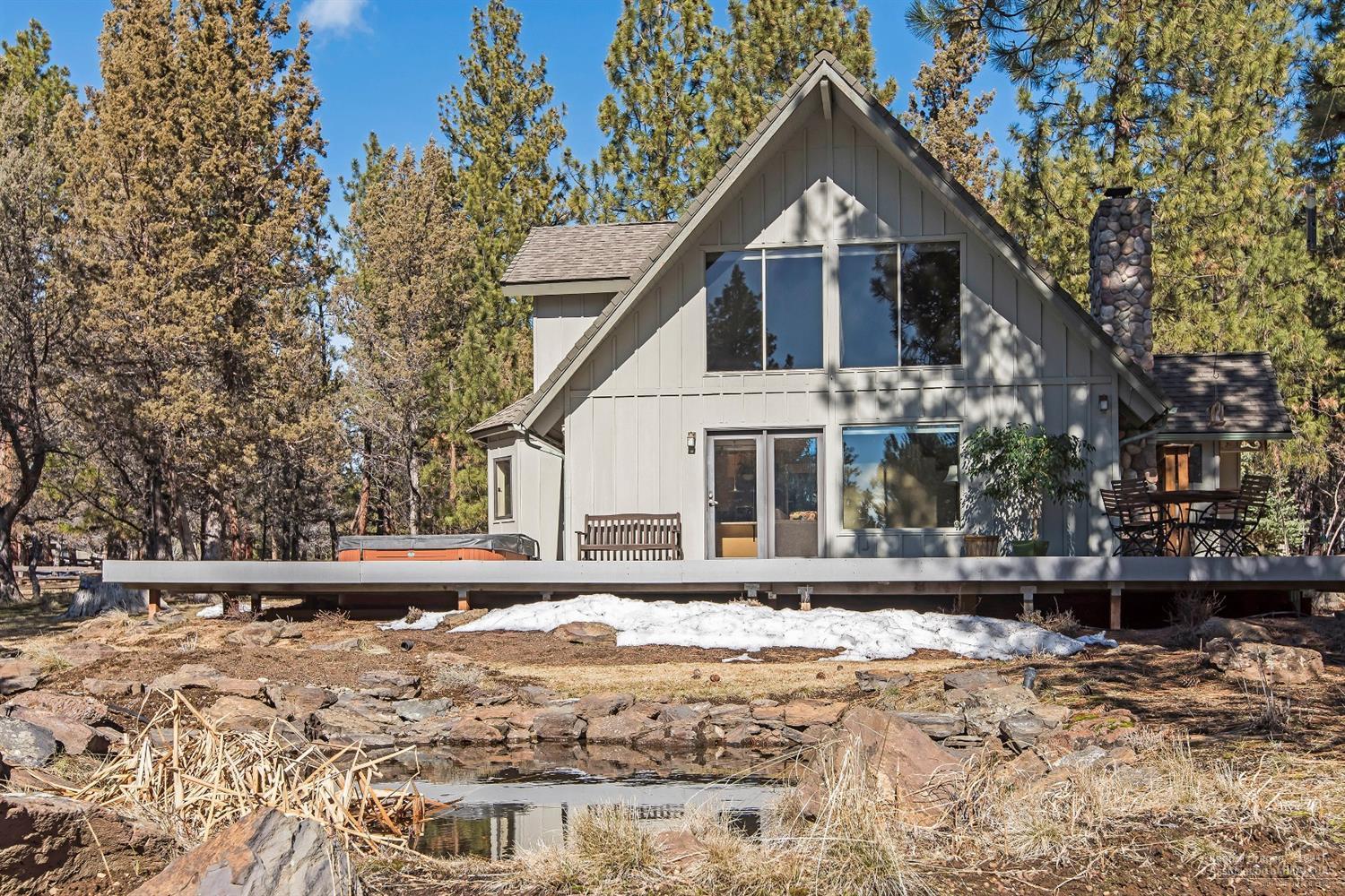 16033 Cattle Drive Road Sisters, OR 97759 - Photo 20 of 22 a front view of a house with a yard
