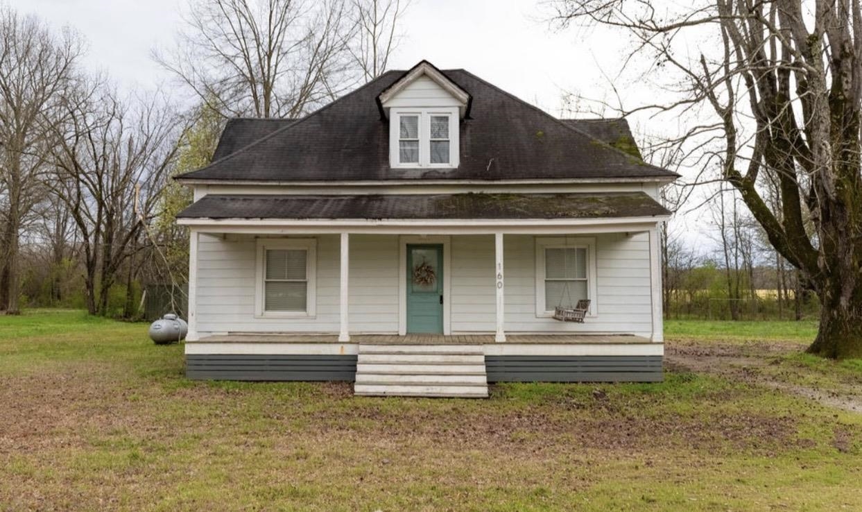 160 Chewalla Road Ramer, TN 38367 - Photo 1 of 39 View of front of property featuring a porch and a front lawn