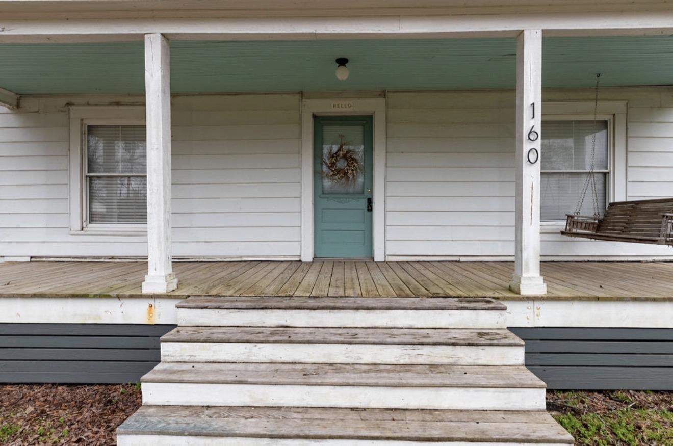 160 Chewalla Road Ramer, TN 38367 - Photo 2 of 39 View of exterior entry with covered porch