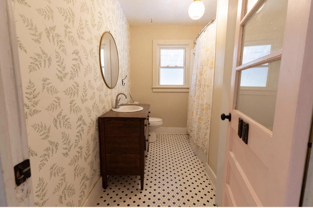 160 Chewalla Road Ramer, TN 38367 - Photo 22 of 39 Full bathroom featuring a shower with curtain, vanity, and wallpapered walls
