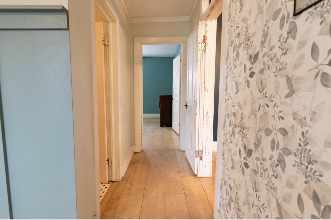 160 Chewalla Road Ramer, TN 38367 - Photo 26 of 39 Hall featuring light wood-type flooring and ornamental molding