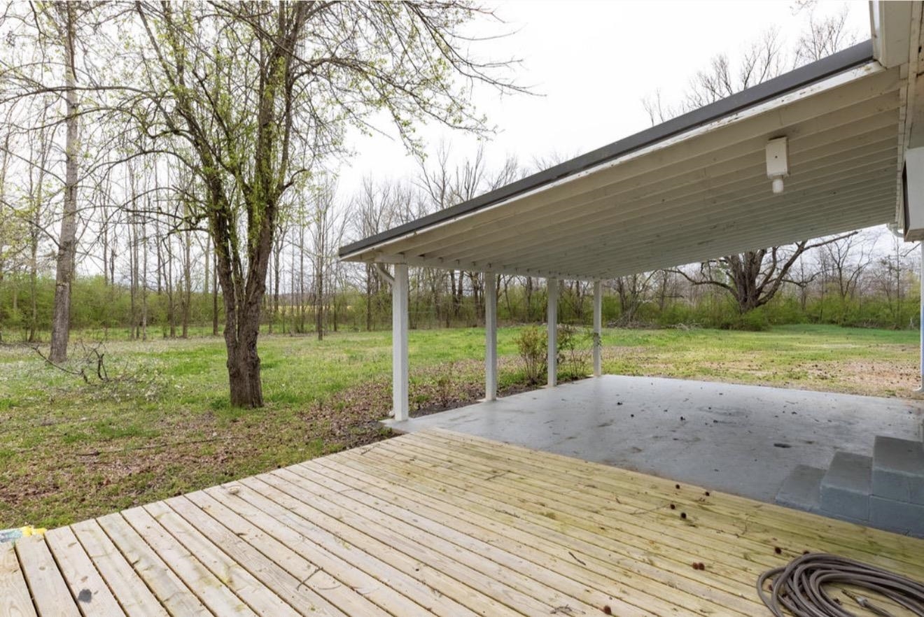160 Chewalla Road Ramer, TN 38367 - Photo 36 of 39 Wooden terrace with a yard