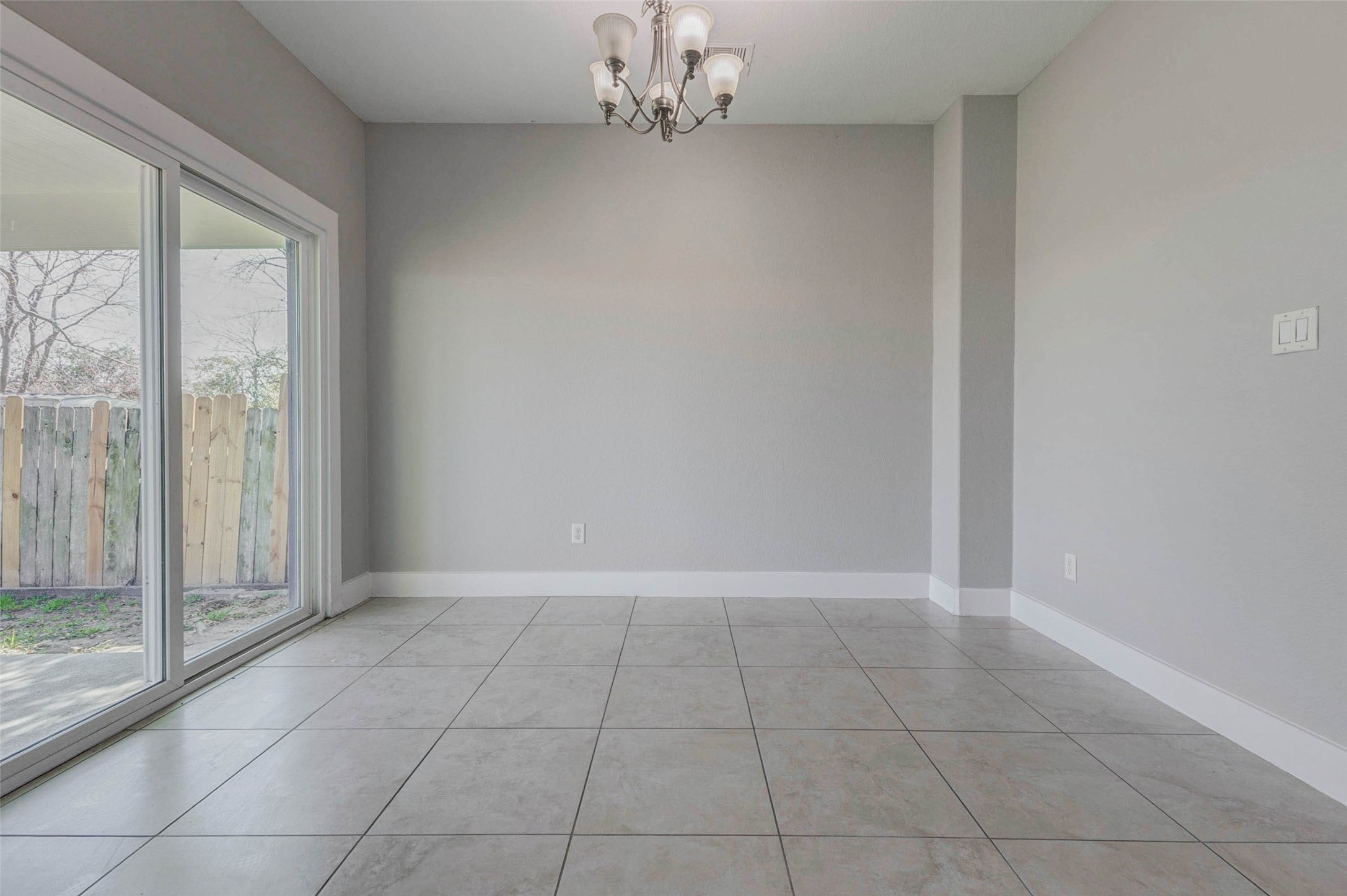 4834 Hollow Hook Road, Unit A Houston, TX 77041 - Photo 11 of 30 a view of an empty room with a window