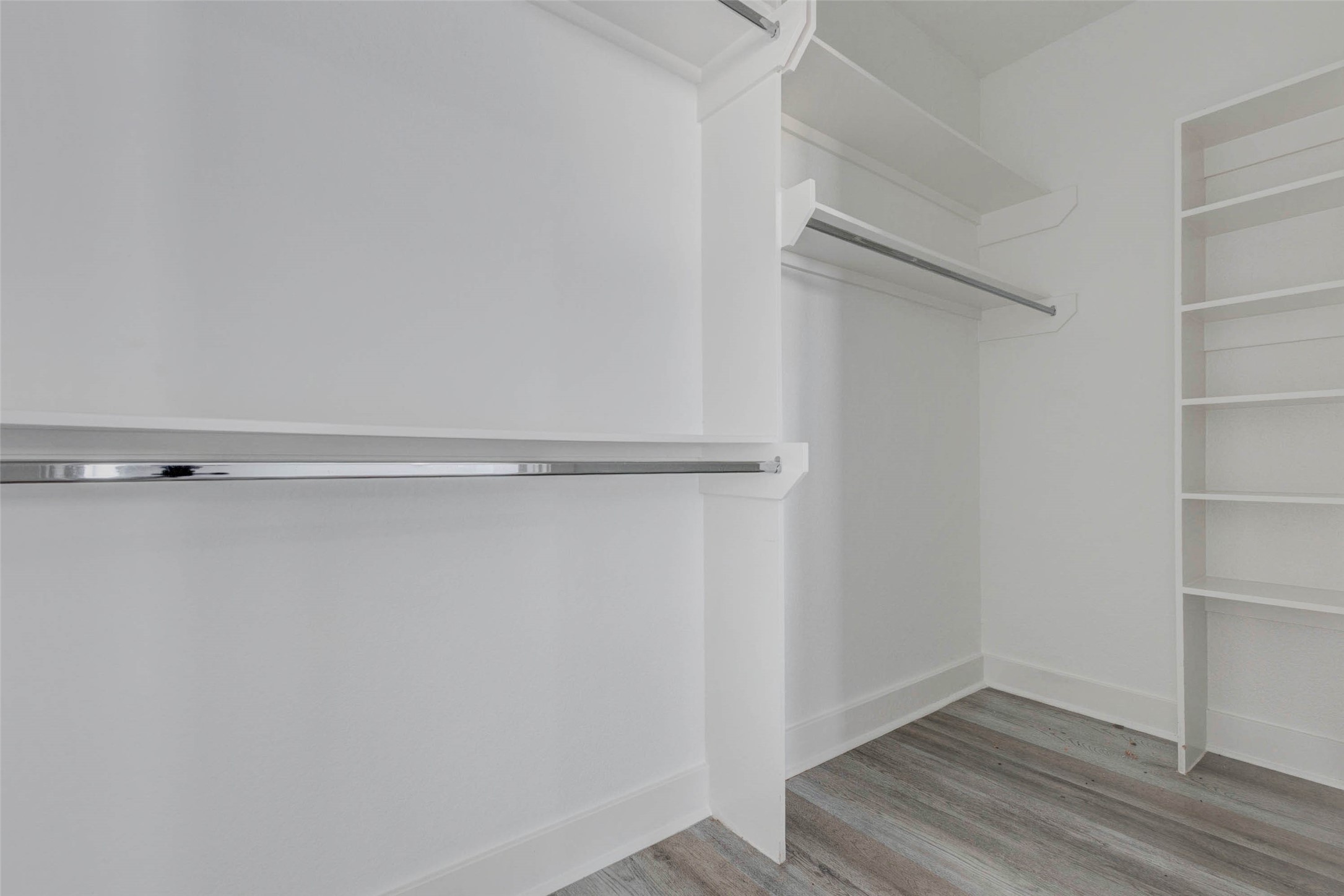 4834 Hollow Hook Road, Unit A Houston, TX 77041 - Photo 18 of 30 a view of an empty walk in closet