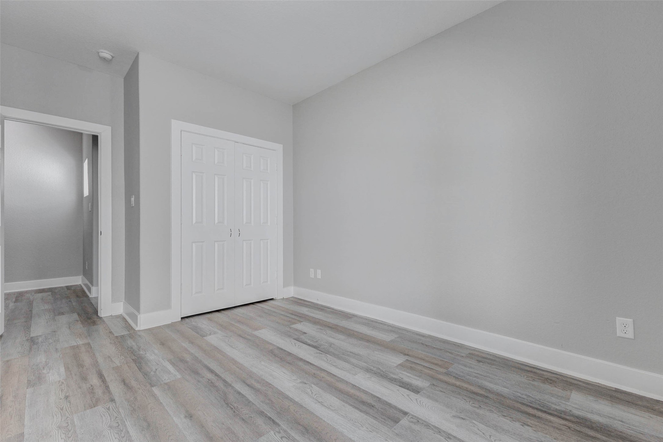 4834 Hollow Hook Road, Unit A Houston, TX 77041 - Photo 22 of 30 a view of an empty room with wooden floor