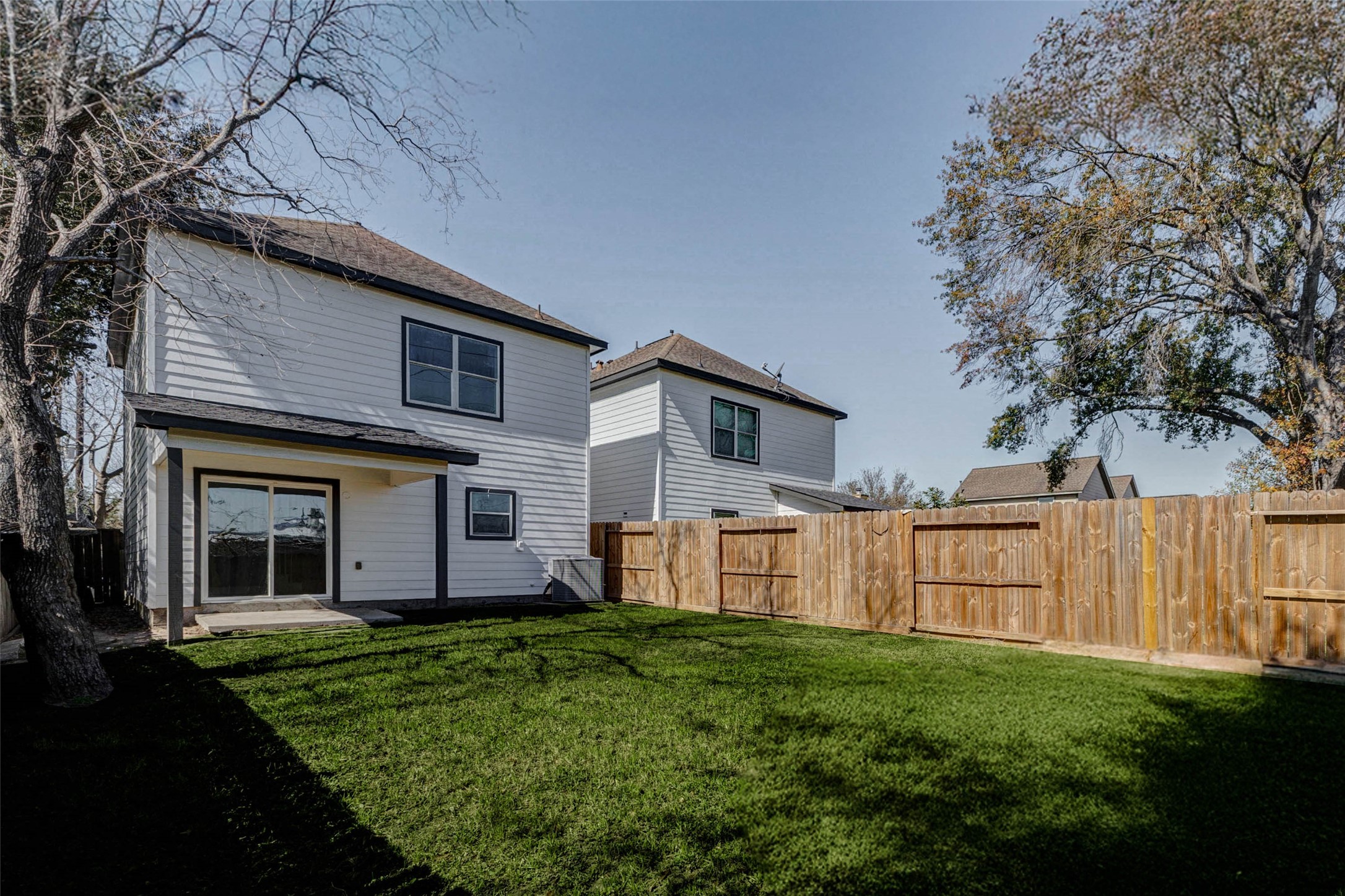4834 Hollow Hook Road, Unit A Houston, TX 77041 - Photo 29 of 30 a view of a house with backyard and garden
