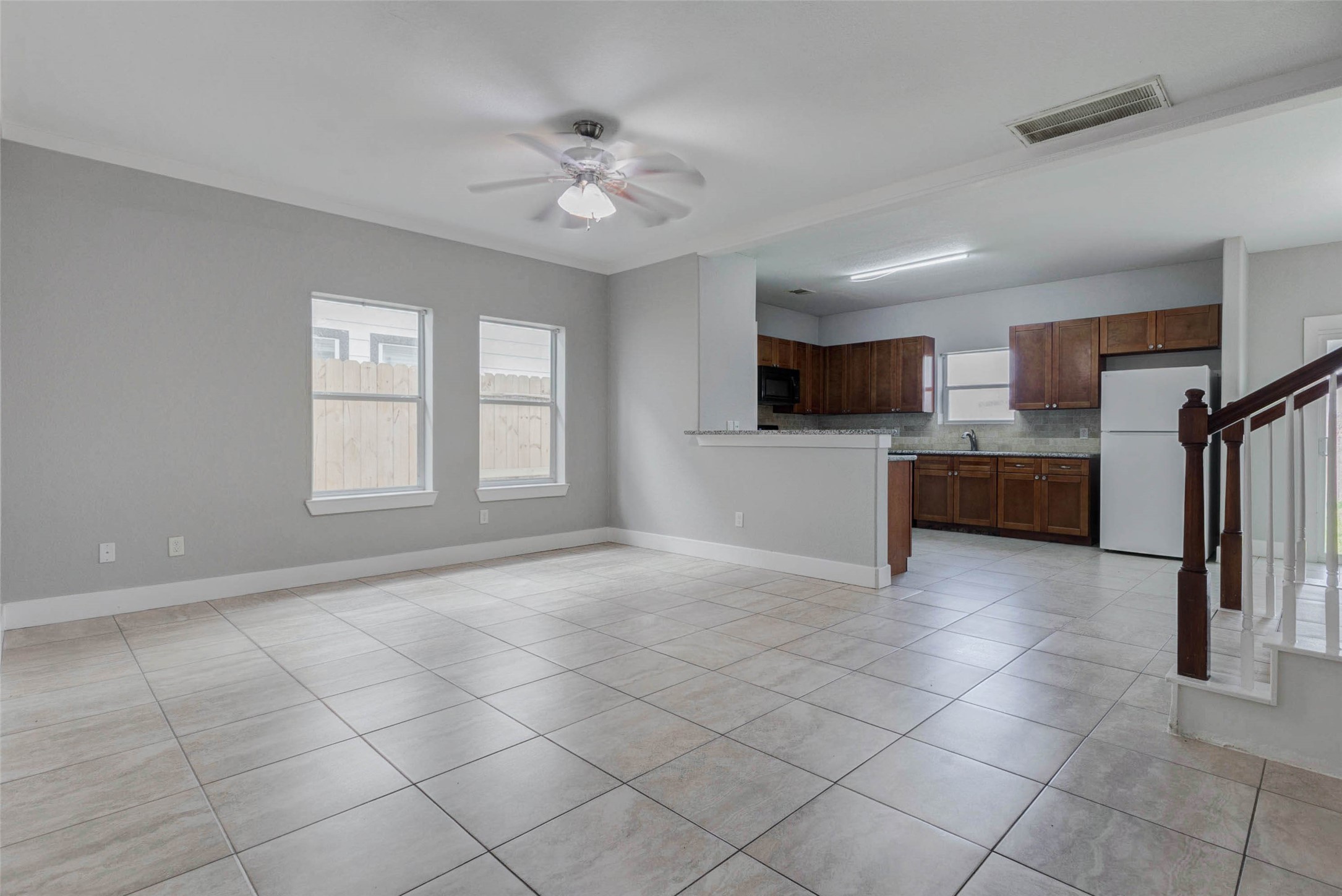 4834 Hollow Hook Road, Unit A Houston, TX 77041 - Photo 4 of 30 a view of livingroom with furniture chandelier fan and windows