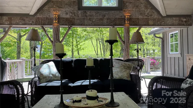 a front view of a house with garden and patio