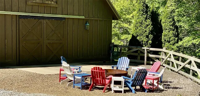 a view of a park with large trees