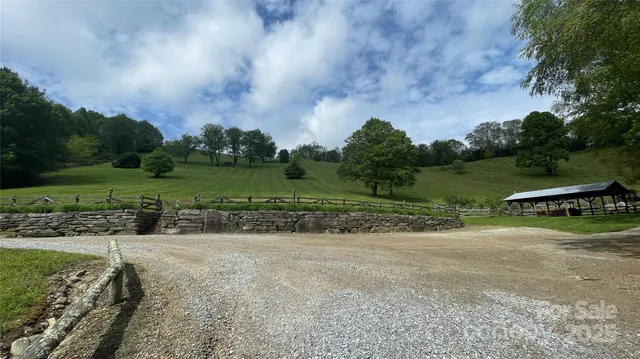 a view of backyard with outdoor seating