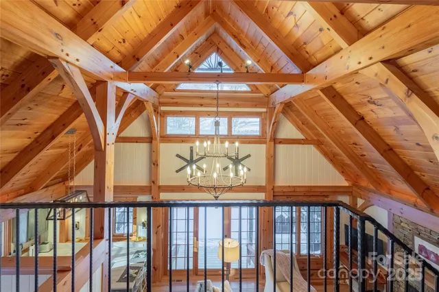 a bed room with a bed and a chair