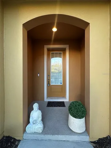 a kitchen with stainless steel appliances granite countertop a refrigerator stove and sink