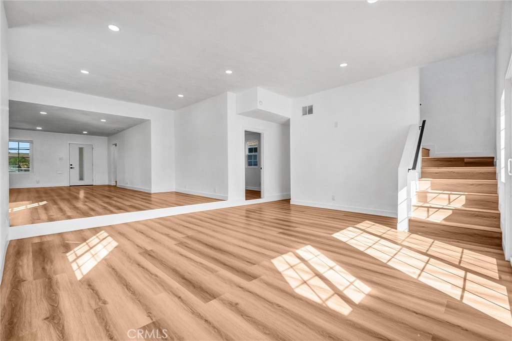 1200 South Castlegate Avenue Compton, CA 90221 - Photo 14 of 39 a view of a livingroom with wooden floor