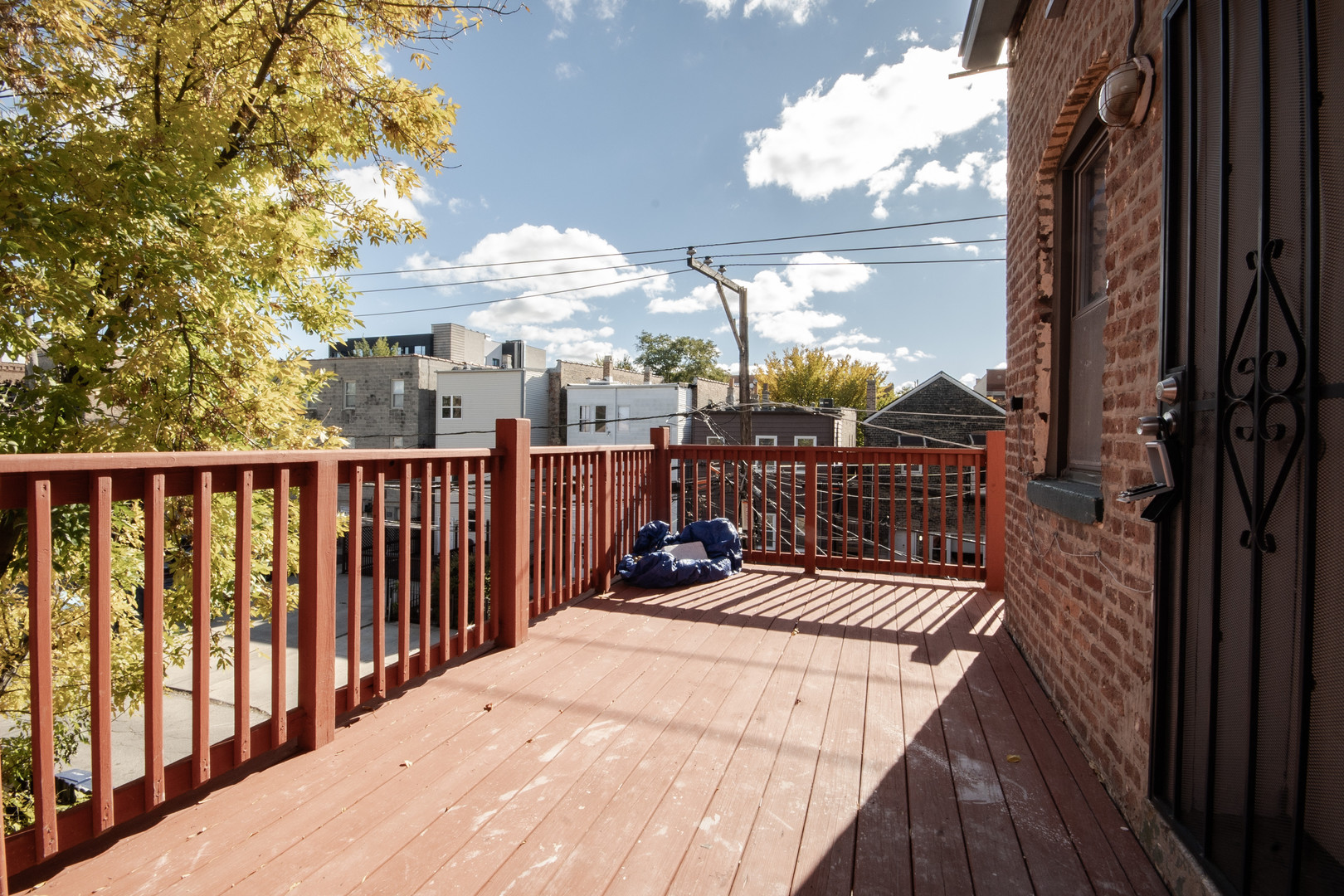 925 South Laflin Street, Unit 2R Chicago, IL 60607 - Photo 22 of 29 a view of a balcony with wooden floor