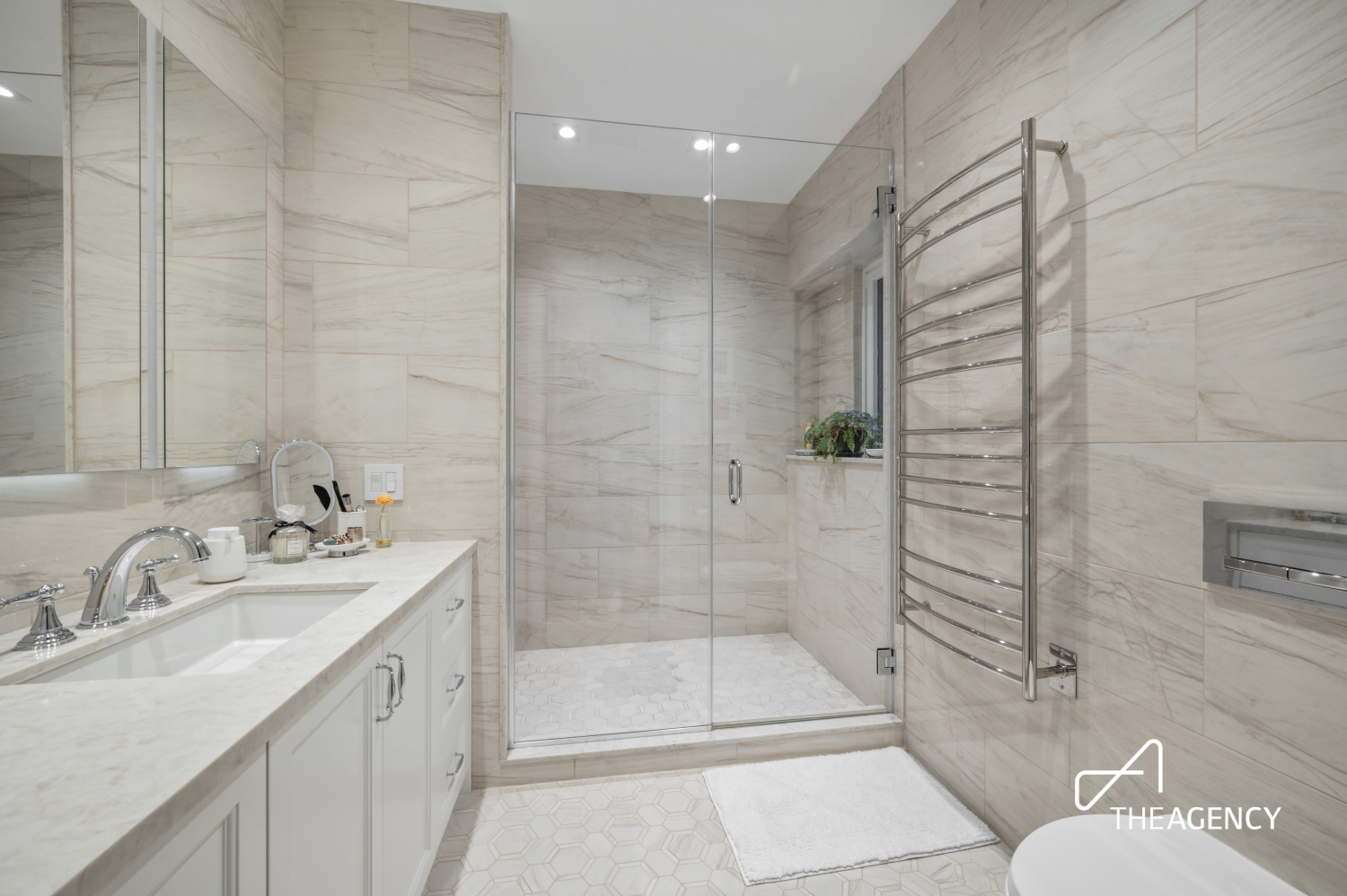 303 West 80th Street, Unit 2B1B Manhattan, NY 10024 - Photo 10 of 16 a bathroom with a sink toilet and shower