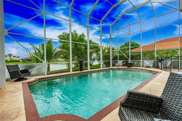 a view of a house with a swimming pool