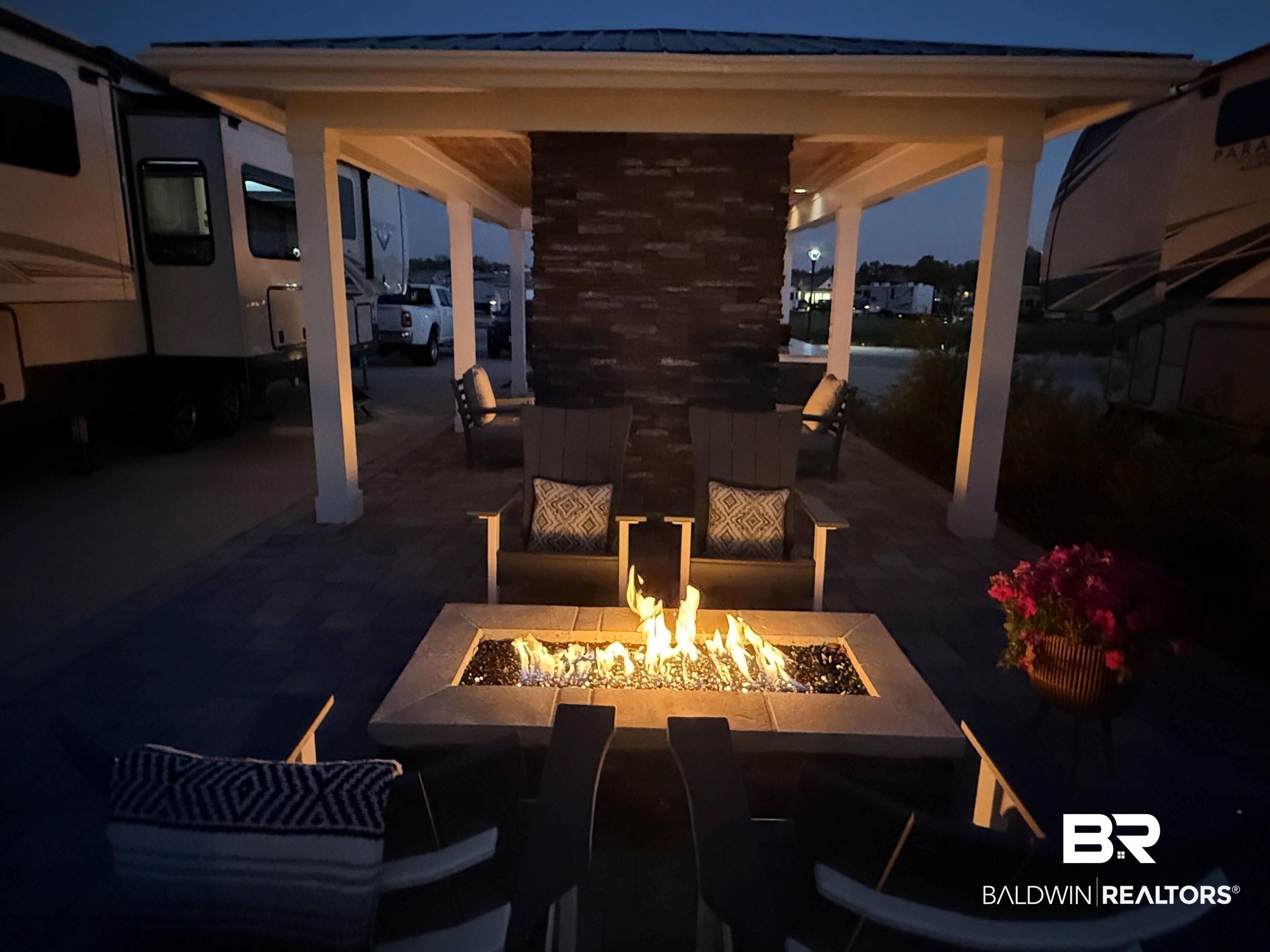 12377 Gateway Drive Elberta, AL 36530 - Photo 29 of 64 Patio at twilight with a patio and a fire pit