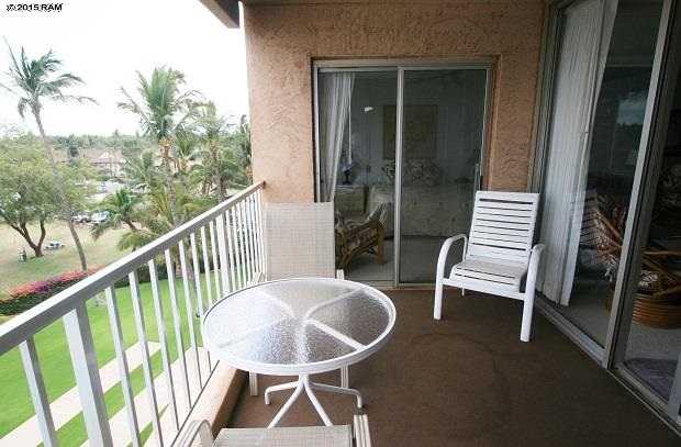 760 South Kihei Road, Unit 507 Kihei, HI 96753 - Photo 2 of 15 a balcony with table and chairs