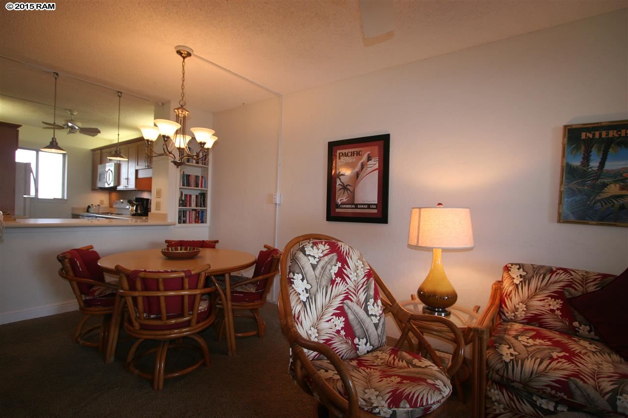 760 South Kihei Road, Unit 507 Kihei, HI 96753 - Photo 4 of 15 a view of a livingroom with furniture and a chandelier