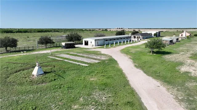 a view of a terrace with a big yard
