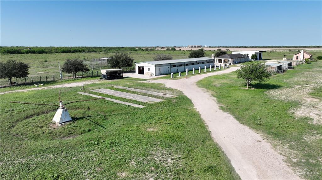37651 Mile 14 Road Edinburg, TX 78541 - Photo 7 of 16 a view of a terrace with a big yard