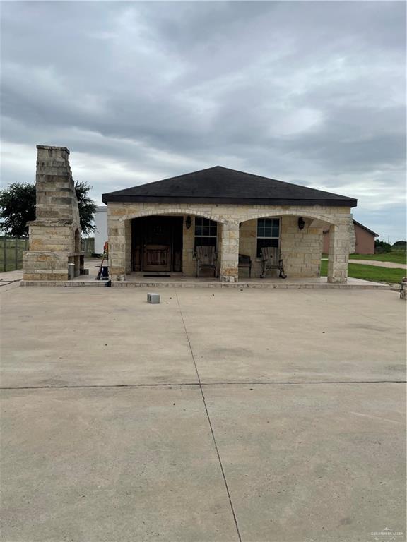37651 Mile 14 Road Edinburg, TX 78541 - Photo 9 of 16 a view of house with yard and entertaining space