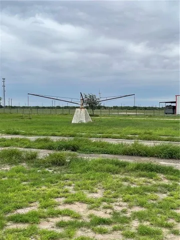 a view of a golf course with a lake