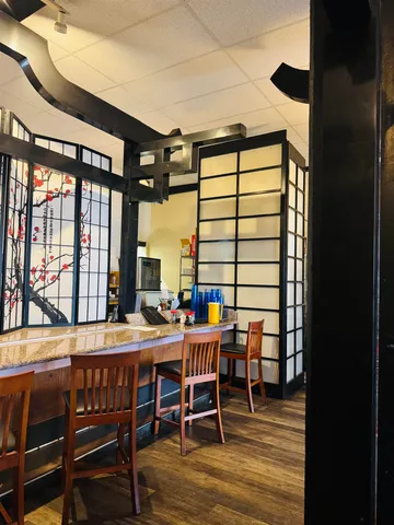 a view of a chairs and table in a room