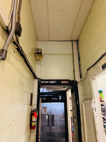 a view of a car park in front of building